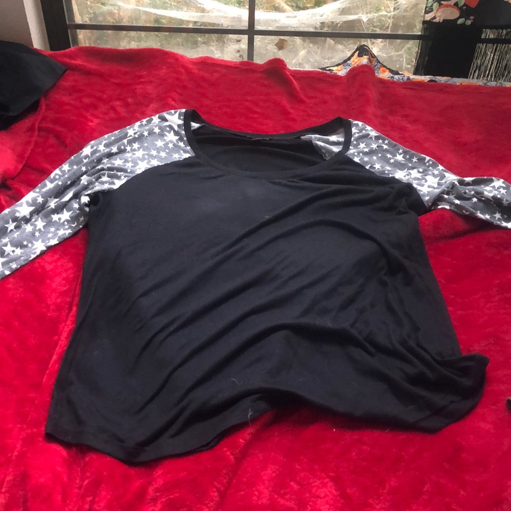Black t shirt with grey star pattern sleeves